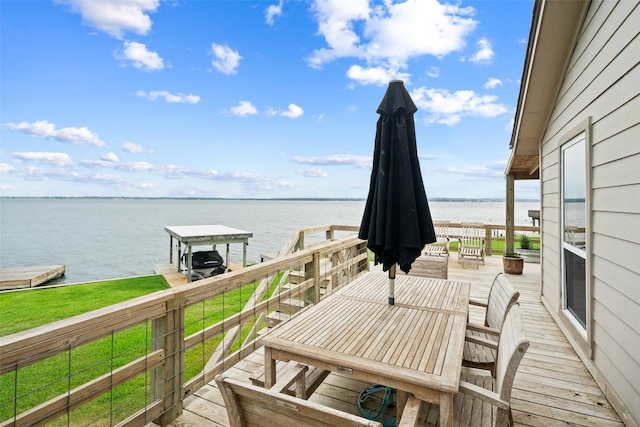 79 Lakeview Vlg, Conroe, TX 77356 - wooden deck with a water view