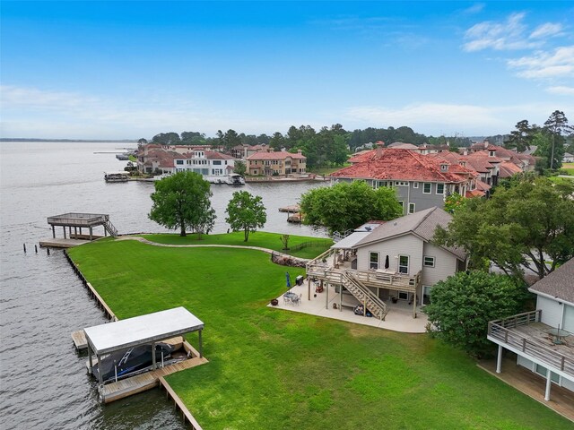 79 Lakeview Vlg, Conroe, TX 77356 - aerial perspective of suburban area with a large body of water