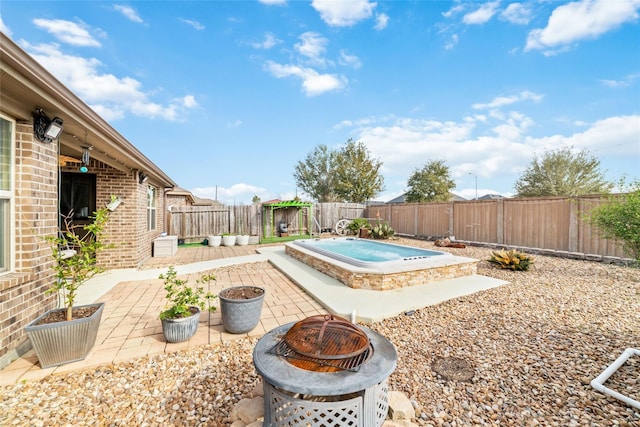 3319 Mcdonough Way, Katy, TX 77494 - view of pool with an outdoor fire pit, a patio, and a fenced backyard