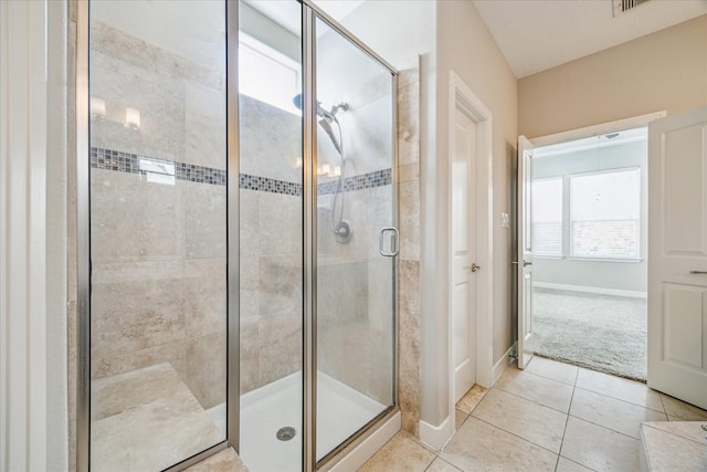 4209 Feagan St, Houston, TX 77007 - full bathroom featuring a shower stall, tile patterned floors, and baseboards