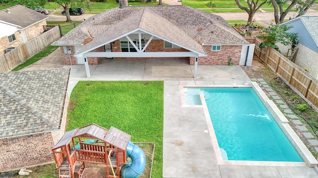 12318 Amado Dr, Houston, TX 77065 - view of swimming pool featuring a playground and a patio area