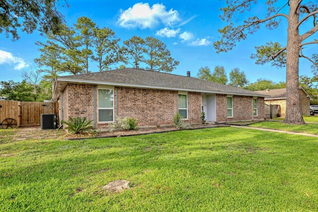 12318 Amado Dr, Houston, TX 77065 - single story home with brick siding, central AC unit, and a shingled roof