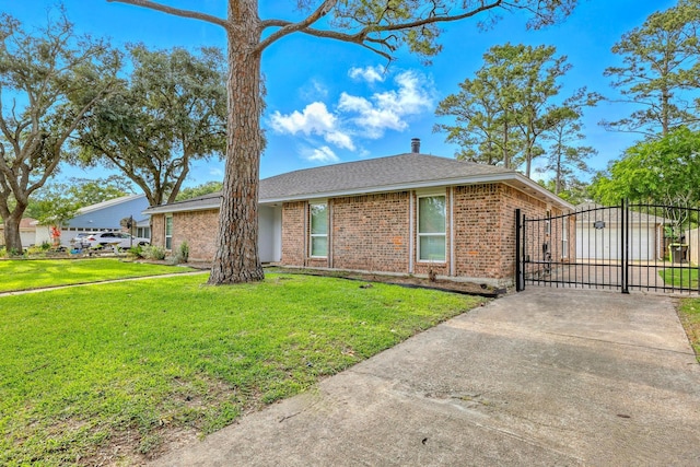 12318 Amado Dr, Houston, TX 77065 - view of front of property featuring a gate, brick siding, concrete driveway, and roof with shingles