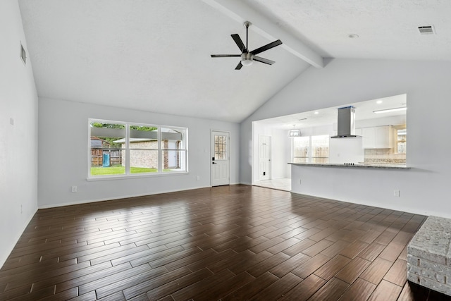 12318 Amado Dr, Houston, TX 77065 - unfurnished living room featuring a ceiling fan, wood tiled floors, beamed ceiling, baseboards, and high vaulted ceiling