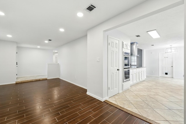 12318 Amado Dr, Houston, TX 77065 - spare room featuring baseboards, light wood finished floors, and recessed lighting