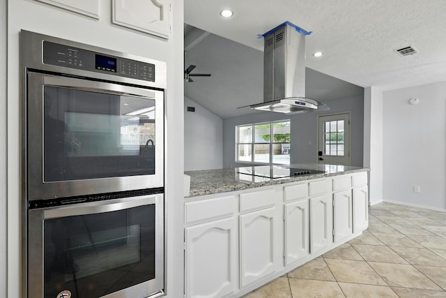 12318 Amado Dr, Houston, TX 77065 - kitchen featuring extractor fan, white cabinetry, light stone countertops, double oven, and black electric cooktop