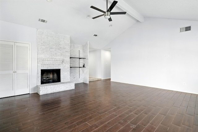 12318 Amado Dr, Houston, TX 77065 - unfurnished living room featuring beamed ceiling, ceiling fan, dark wood-type flooring, high vaulted ceiling, and a fireplace