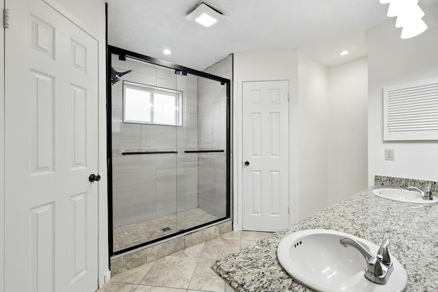 12318 Amado Dr, Houston, TX 77065 - full bath featuring a stall shower and double vanity
