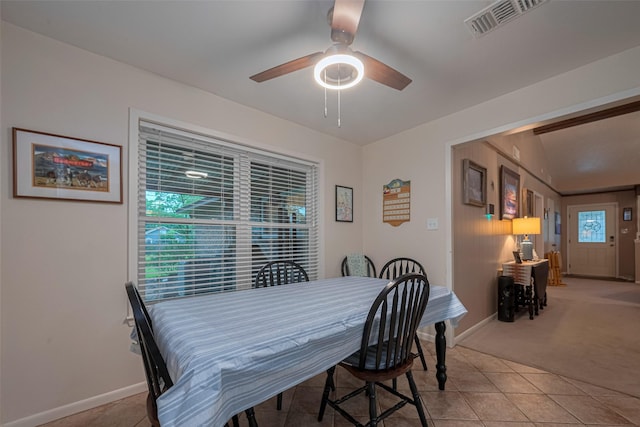 1745 15th St, Hempstead, TX 77445 - dining room with a ceiling fan, baseboards, light tile patterned flooring, and light colored carpet