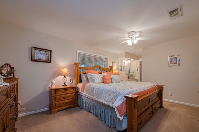 1745 15th St, Hempstead, TX 77445 - bedroom with light carpet, baseboards, and a ceiling fan