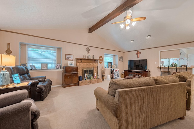 1745 15th St, Hempstead, TX 77445 - carpeted living room with a ceiling fan and a brick fireplace