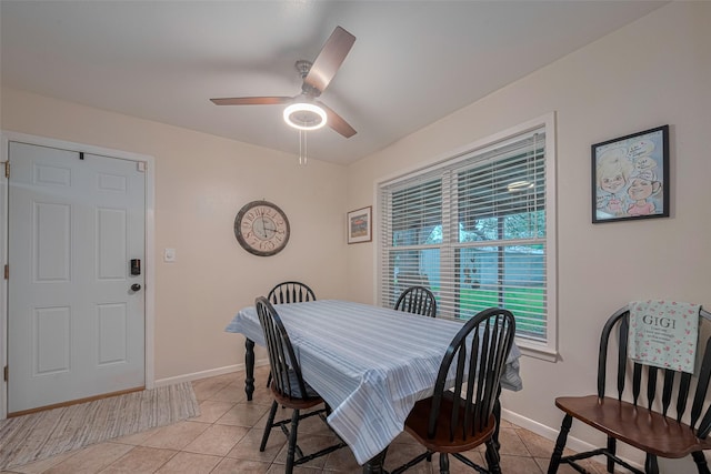 1745 15th St, Hempstead, TX 77445 - dining space with light tile patterned flooring, baseboards, and a ceiling fan