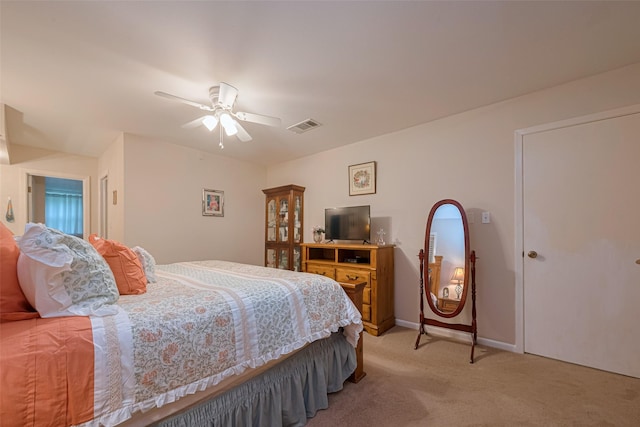 1745 15th St, Hempstead, TX 77445 - bedroom featuring light colored carpet, ceiling fan, and baseboards