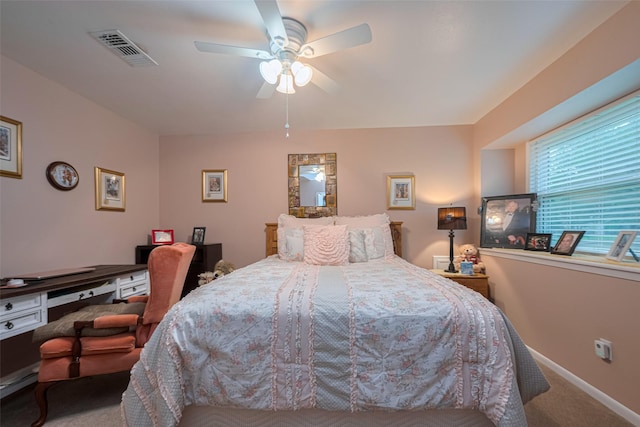 1745 15th St, Hempstead, TX 77445 - bedroom featuring carpet floors, a ceiling fan, and baseboards