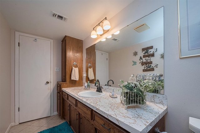 1745 15th St, Hempstead, TX 77445 - bathroom featuring tile patterned flooring, vanity, and baseboards