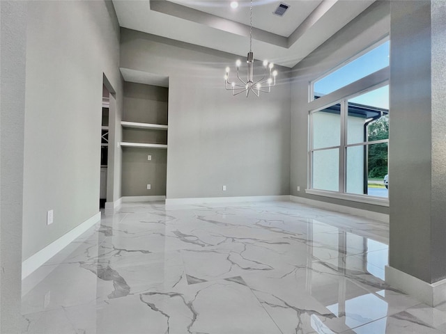 1156 Rd 6604, Dayton, TX 77535 - spare room with a chandelier, healthy amount of natural light, and baseboards
