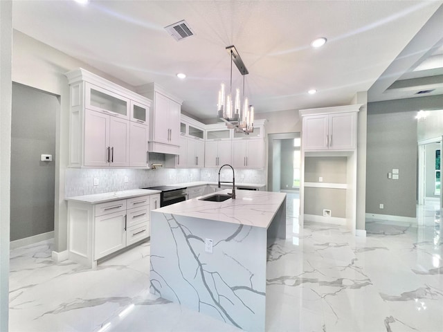1156 Rd 6604, Dayton, TX 77535 - kitchen featuring a sink, recessed lighting, backsplash, baseboards, and light marble finish floors