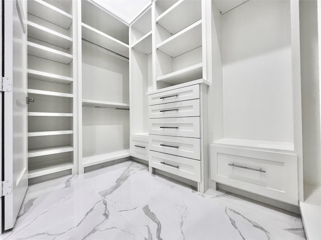 1156 Rd 6604, Dayton, TX 77535 - walk in closet with light marble finish flooring