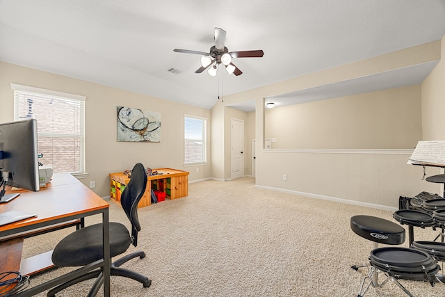home office featuring a ceiling fan, baseboards, and carpet floors