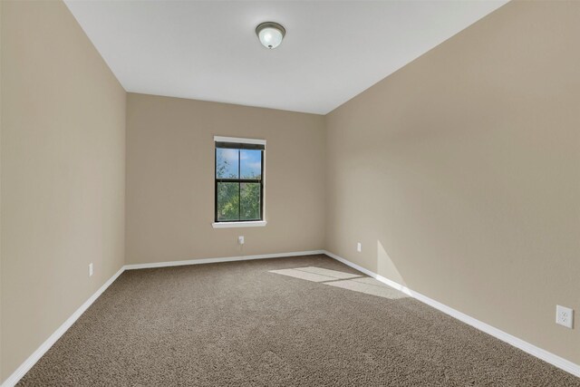 17306 Legend Brook Ct, Tomball, TX 77375 - carpeted empty room with baseboards