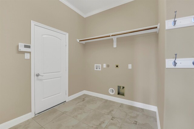 17306 Legend Brook Ct, Tomball, TX 77375 - laundry room with gas dryer hookup, electric dryer hookup, ornamental molding, hookup for a washing machine, and baseboards