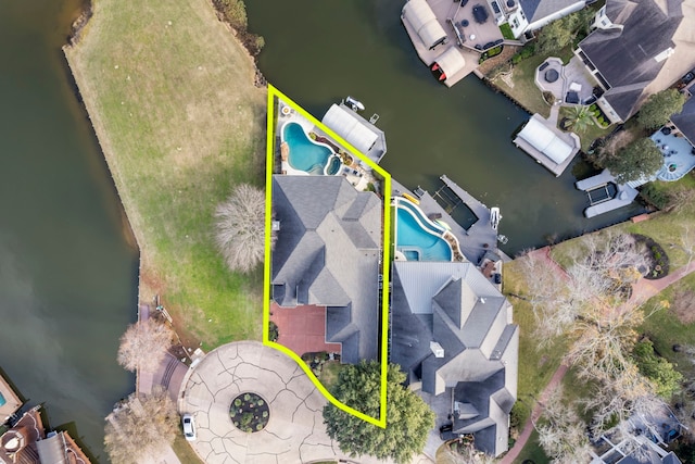 44 Logansport Ct, Montgomery, TX 77356 - aerial view of property and surrounding area featuring a pool and property parcel outlined