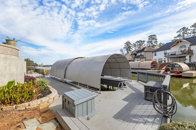 44 Logansport Ct, Montgomery, TX 77356 - wooden deck with a water view and a boat dock