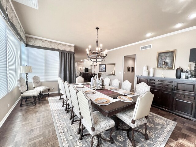 2016 Main St Unit Ph3, Houston, TX 77002 - dining space featuring a chandelier, baseboards, and crown molding