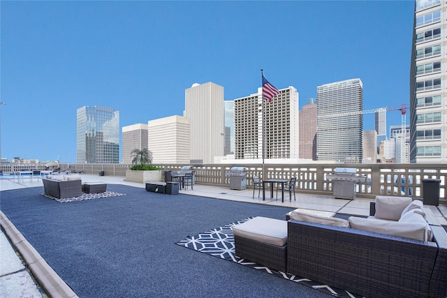 2016 Main St Unit Ph3, Houston, TX 77002 - view of patio / terrace featuring outdoor lounge area, grilling area, and a view of skyline