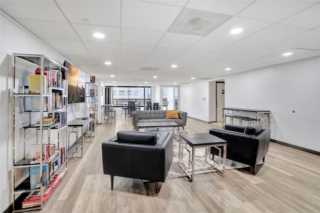 2016 Main St Unit Ph3, Houston, TX 77002 - living area featuring light wood-style flooring, recessed lighting, and baseboards