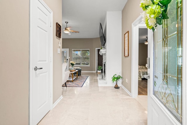 6719 Woodland Oaks, Magnolia, TX 77354 - hall featuring baseboards and light tile patterned floors