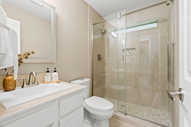 6719 Woodland Oaks, Magnolia, TX 77354 - full bathroom featuring a shower stall, toilet, and vanity