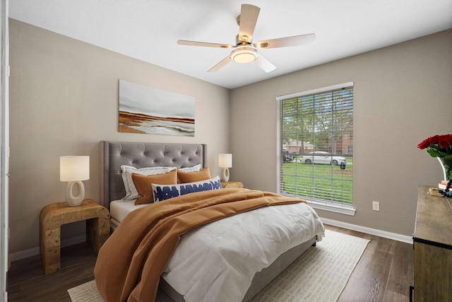 6719 Woodland Oaks, Magnolia, TX 77354 - bedroom featuring baseboards, dark wood-style floors, and ceiling fan