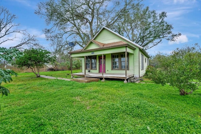 7027 Iowa Colony Blvd, Rosharon, TX 77583 - view of front of house with covered porch and a front yard