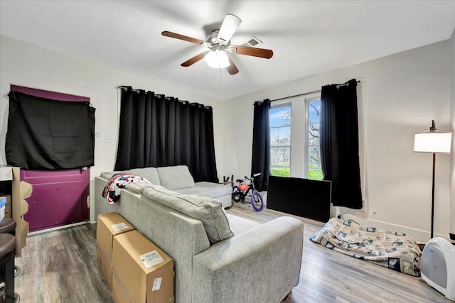 7027 Iowa Colony Blvd, Rosharon, TX 77583 - bedroom featuring wood finished floors and a ceiling fan