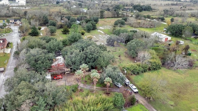 7027 Iowa Colony Blvd, Rosharon, TX 77583 - aerial overview of property's location featuring a tree filled landscape