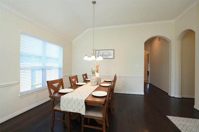 15623 Lavender Bay Ln, Cypress, TX 77429 - dining space featuring arched walkways, dark wood-style flooring, ornamental molding, baseboards, and vaulted ceiling