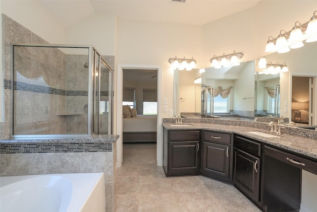 15623 Lavender Bay Ln, Cypress, TX 77429 - ensuite bathroom with a shower stall, double vanity, lofted ceiling, tile patterned flooring, and a bath