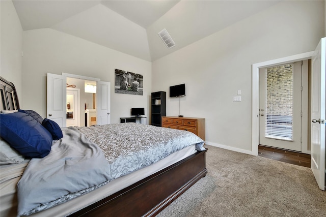 16711 Ramsay Cascades Dr, Humble, TX 77346 - carpeted bedroom featuring high vaulted ceiling, baseboards, and connected bathroom