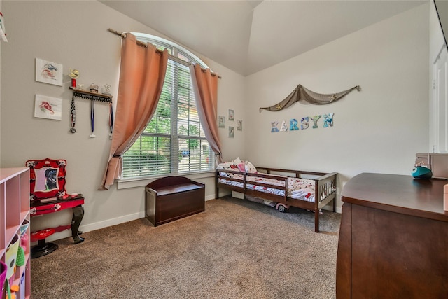 16711 Ramsay Cascades Dr, Humble, TX 77346 - carpeted bedroom featuring baseboards and vaulted ceiling