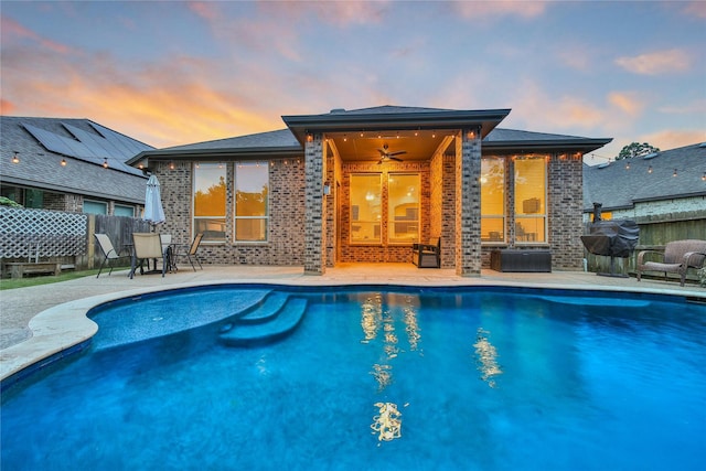 16711 Ramsay Cascades Dr, Humble, TX 77346 - pool at dusk featuring a patio area