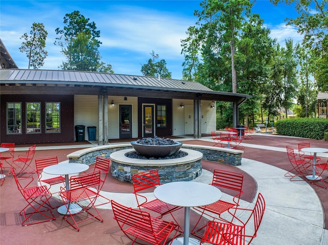 16711 Ramsay Cascades Dr, Humble, TX 77346 - view of patio / terrace with an outdoor fire pit