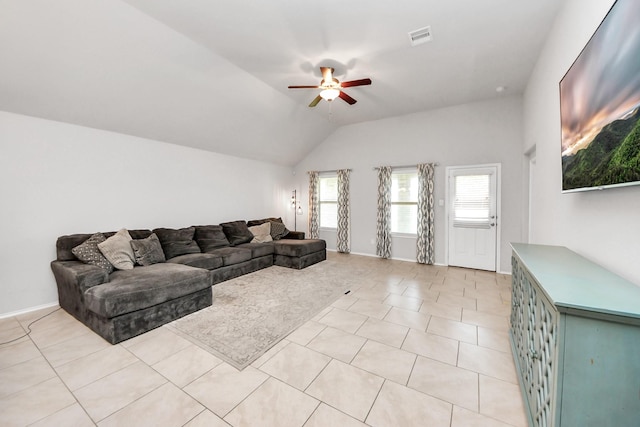 4827 San Gregorio Ln, Katy, TX 77493 - living room featuring ceiling fan, vaulted ceiling, light tile patterned flooring, and baseboards