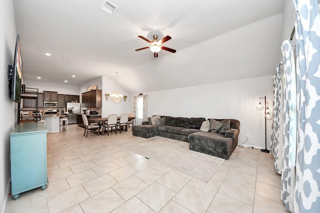 4827 San Gregorio Ln, Katy, TX 77493 - living room with a ceiling fan, lofted ceiling, light tile patterned flooring, and recessed lighting