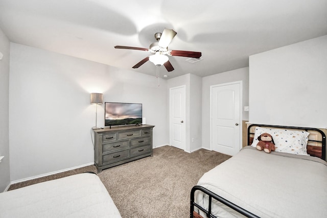 4827 San Gregorio Ln, Katy, TX 77493 - carpeted bedroom featuring baseboards and ceiling fan