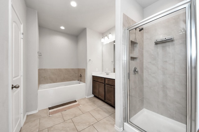 4827 San Gregorio Ln, Katy, TX 77493 - full bathroom featuring tile patterned floors, a shower stall, a bath, recessed lighting, and vanity