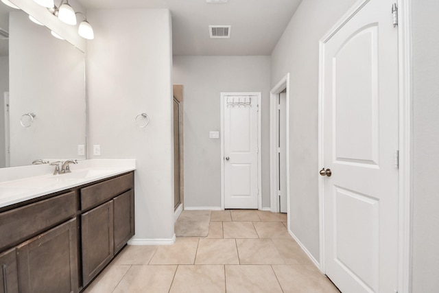4827 San Gregorio Ln, Katy, TX 77493 - full bath featuring vanity, a shower stall, tile patterned floors, and baseboards