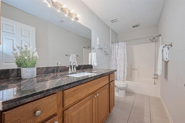 10315 Sun City Ct, Houston, TX 77099 - bathroom featuring toilet, tile patterned flooring, vanity, shower / bath combo with shower curtain, and baseboards