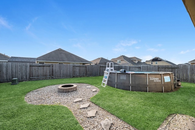 8315 Egret Bay Cir, Baytown, TX 77523 - view of yard with an outdoor fire pit