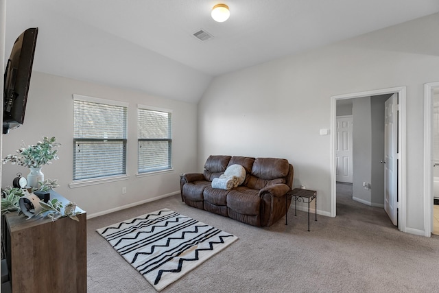 8315 Egret Bay Cir, Baytown, TX 77523 - living area featuring carpet flooring, baseboards, and lofted ceiling